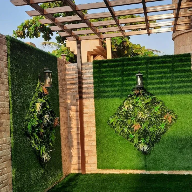 تركيب برجولات وتنسيق عشب صناعي في القصيم