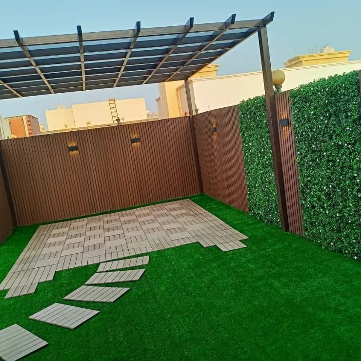 تركيب برجولات وتنسيق عشب صناعي في القصيم