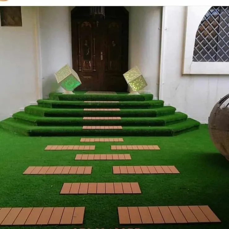 تركيب برجولات وتنسيق عشب صناعي في القصيم