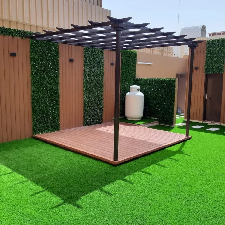 تركيب برجولات وتنسيق عشب صناعي في القصيم