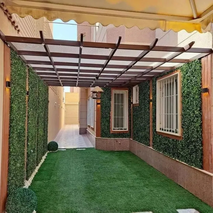 تركيب برجولات وتنسيق عشب صناعي في القصيم