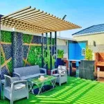 تركيب برجولات وتنسيق عشب صناعي في القصيم